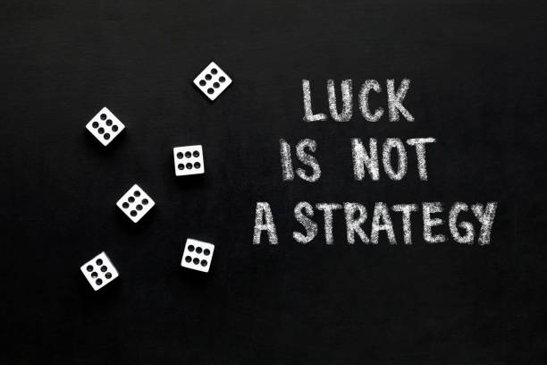 istock Dice and text,, Luck is not a strategy