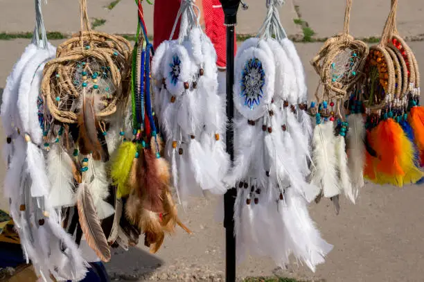 Photo of National Peruvian feather jewelry is sold in the market