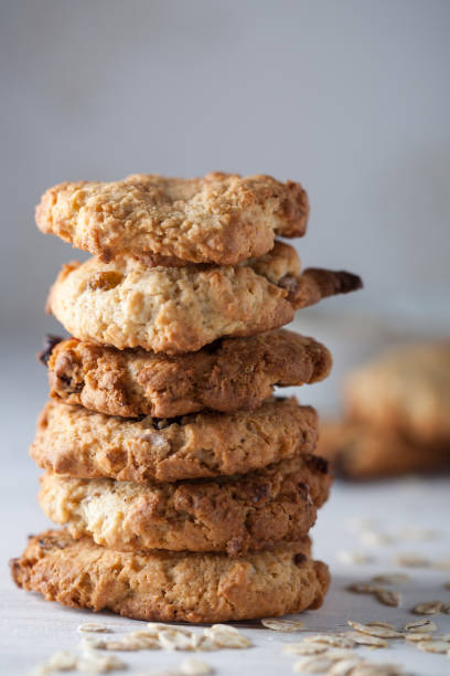 istock A stack of homemade oatmeal cookies on a grey background. 987512624