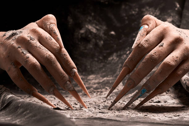 istock paper ash on woman hands 987526982