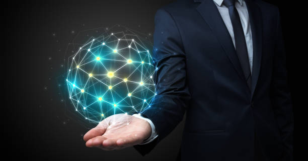 istock Businessman holding global connection concept 987552676