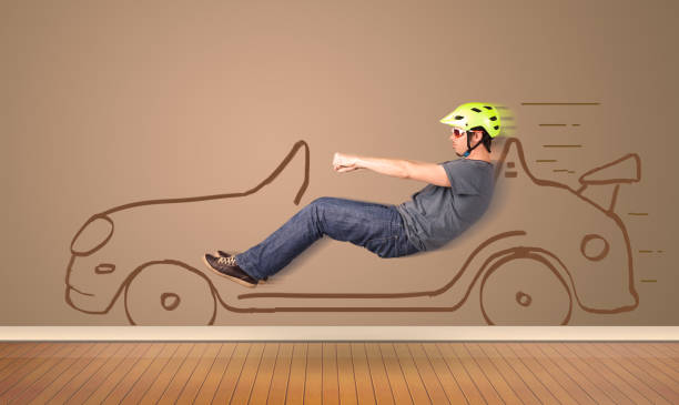 Happy man driving an hand drawn car on the wall
