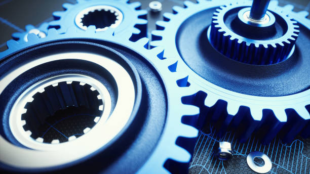 istock Extreme close-up on blue gears machinery part 987562920