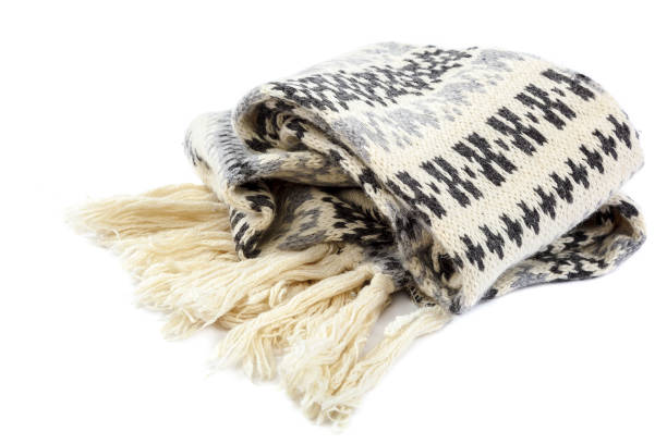 istock Scarf knitted motley on a white background. 987563216
