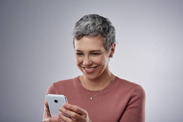 istock Staying connected to her social circle keeps her smiling 987567628