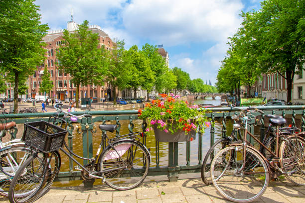 istock Idyllic bridge in Amsterdam with bicycles 987567796