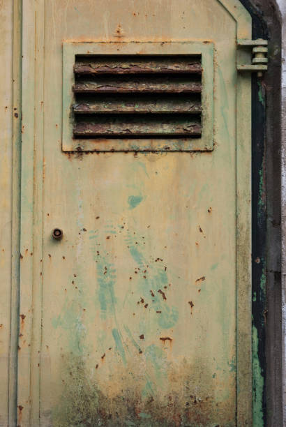 istock Half of an old metal door 987571898
