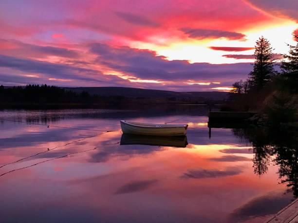 istock Beautiful Sunset Over Scottish Lake 987572682