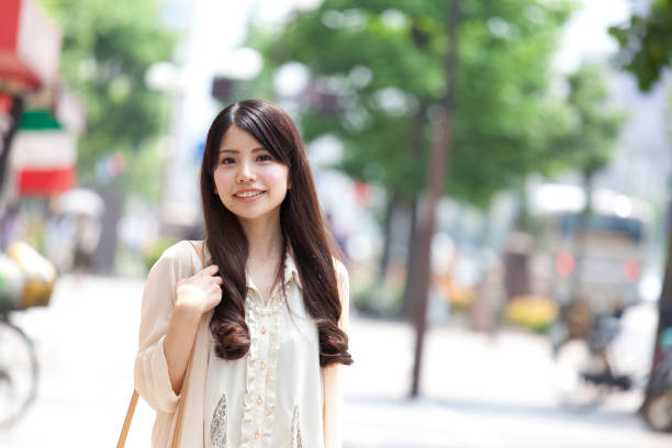 istock A girl walking in the city 987574122