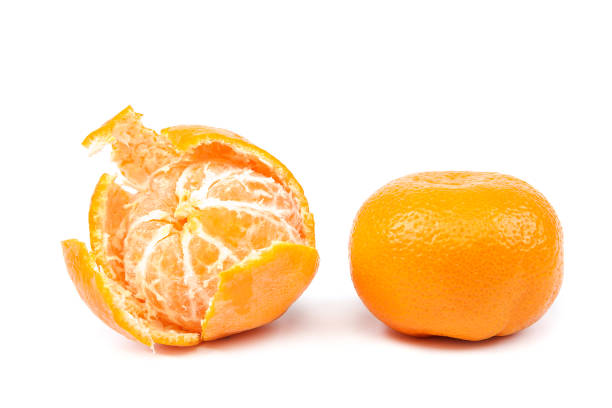 istock Fruits of a tangerine on a white background. 987577686