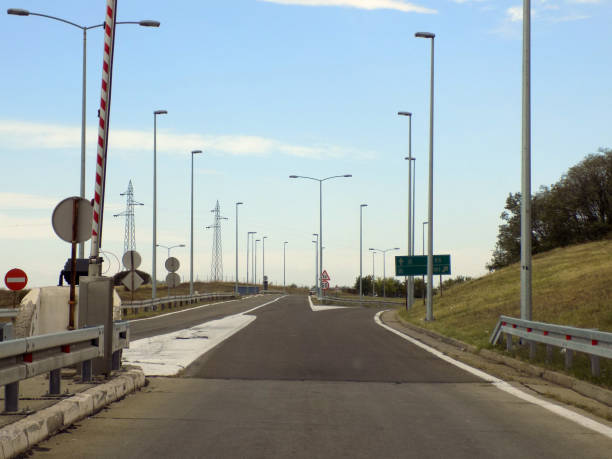 istock Entrance to the expressway through toll booth, and exit from the expressway 987577798