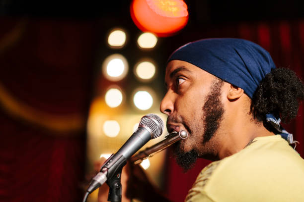 istock African American man playing flute 987579346