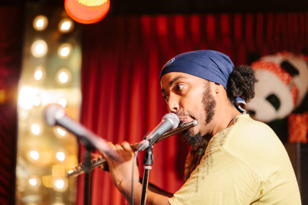 istock African American man playing flute 987579456