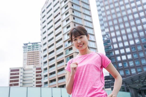 istock Young woman running 987585420