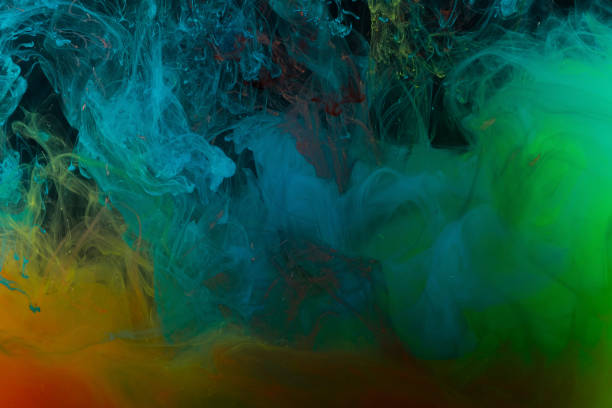 istock Color abstraction on a black background 987595598