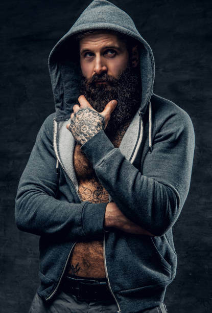 istock Athletic bearded male in a grey hoodie. 987597690