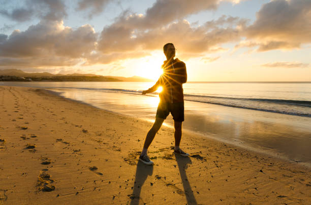 istock Fitness on the beach at sunrise 987602268