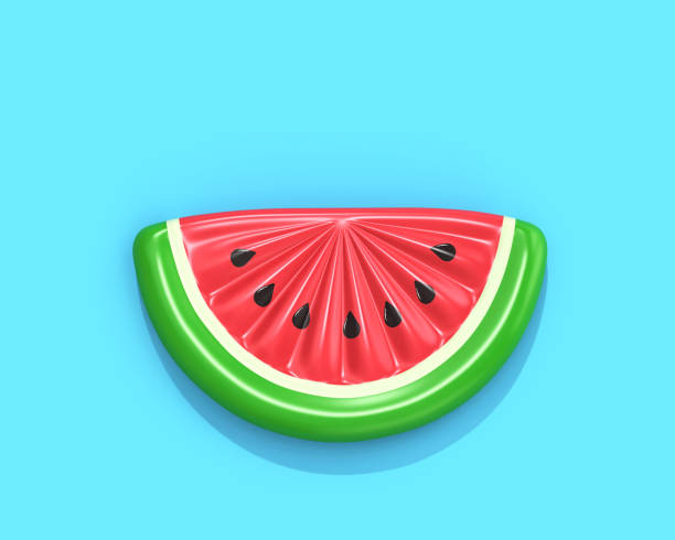 Inflatable watermelon slice on blue background Inflatable watermelon slice isolated on blue background,  top view. 3D rendering with clipping path inflatable stock pictures, royalty-free photos & images