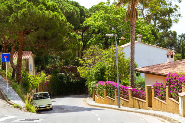 istock Coast beach resort Blanes, castle San Juan, Spain 987605548