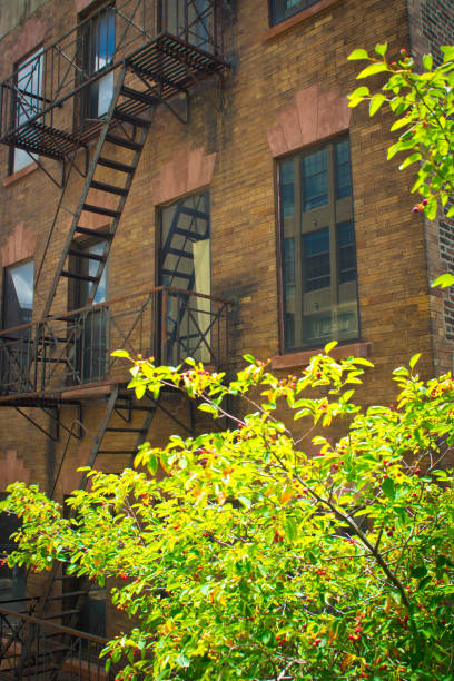 istock Fire escape on New York apartment block 987612106