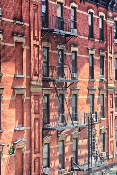 istock Fire escape on New York apartment block 987614688