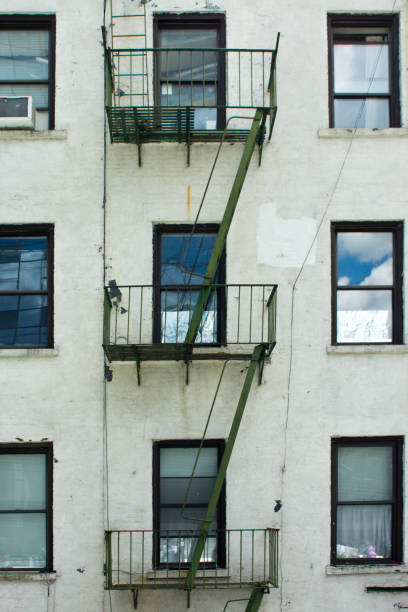 istock Fire escape on New York apartment block 987615076