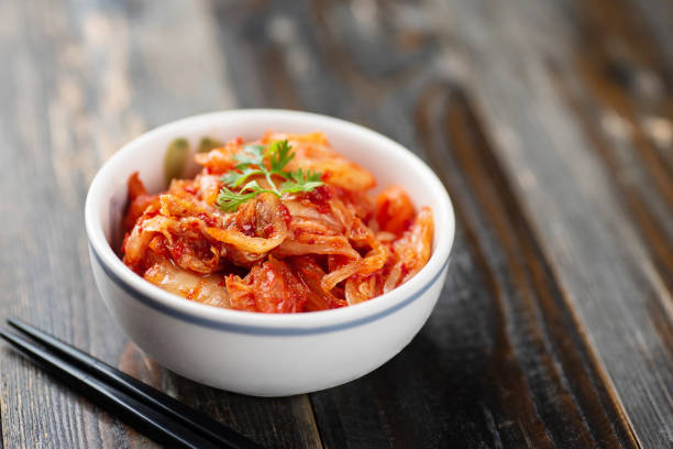 istock Kimchi cabbage in a bowl, Korean food 987616300