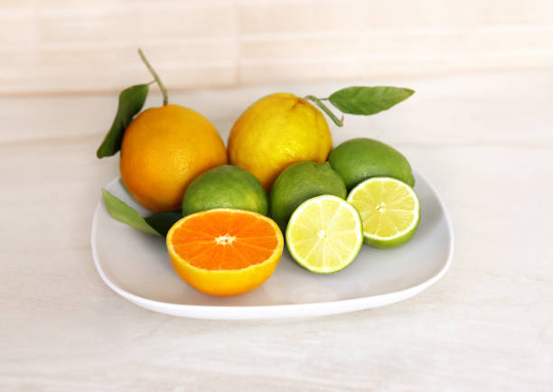 istock Different refreshing citrus fruits. Cocktail ingredients. Fruit set.Green lemon 987623258