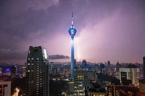 Elevated cityscape skyline during thunder storm