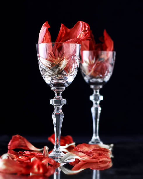 istock Vintage crystal glasses on the black 987633320