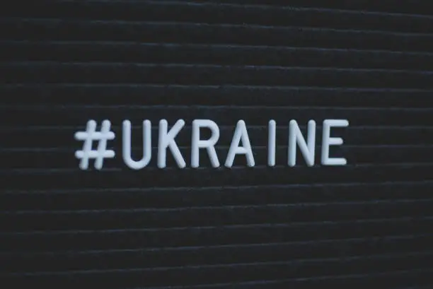 Photo of Hashtag word #ukraine written on the letter board.