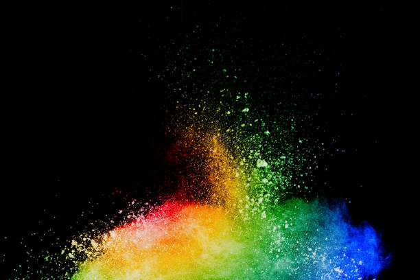 istock Multi color powder explosion isolated on black background. Colored dust splash cloud on black background. Launched colorful particles on background. Painted Holi. 987649272