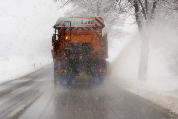 istock snowplow on road while winter conditions 987651472