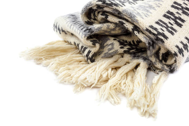 istock Scarf knitted motley on a white background. 987658850