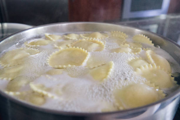 Cooking Homemade pasta, stuffed ravioli stock photo
