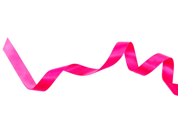 istock Pink festive ribbon isolated on white background 987659754
