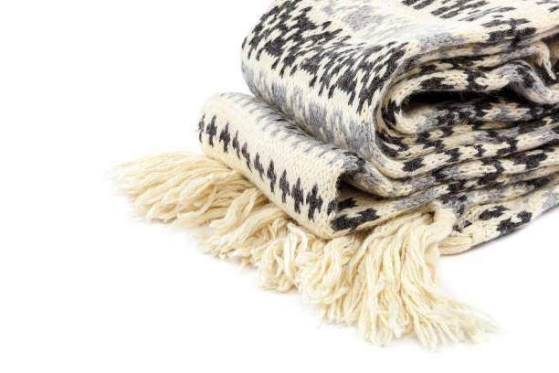 istock Scarf knitted motley on a white background. 987662378