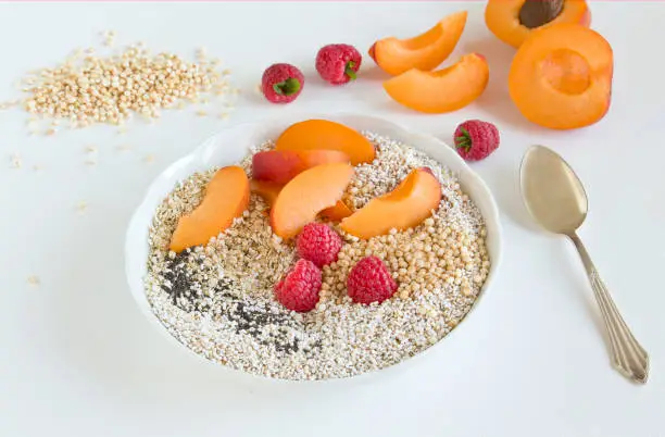 cereal with quinoa, amaranth, chia seeds, fresh raspberries and fresh apricots