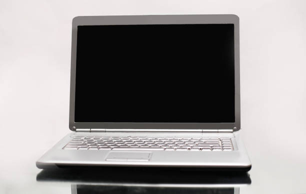 istock closeup of a laptop isolated on a white background 987670354