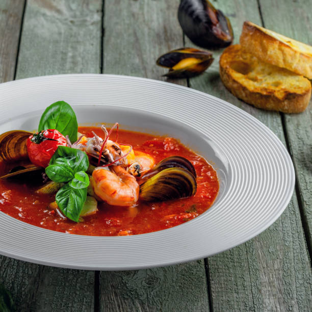 istock Tomato stew with sea food 987670414
