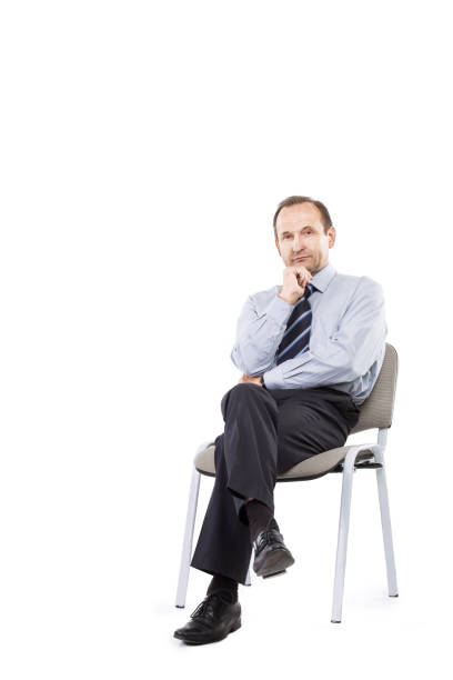 istock Confident businessman isolated on white background 987671840