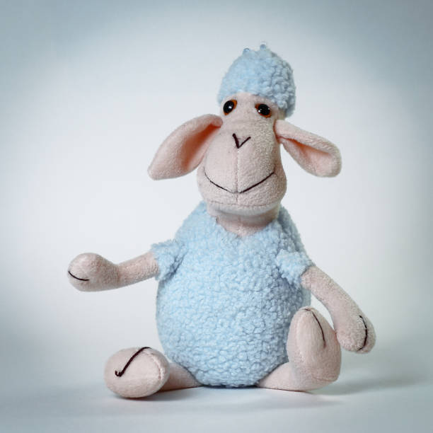 istock funny soft toy sheep.isolated on white 987677474
