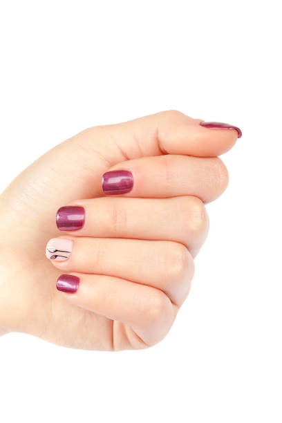 istock Beautiful female hands with manicure on white background 987682978