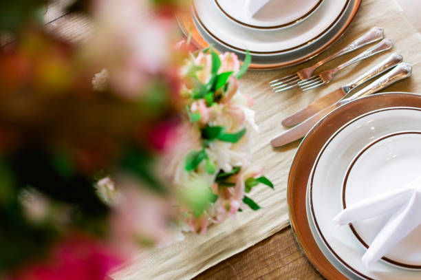 istock Decorating tables for wedding party - party hall vision 987685852