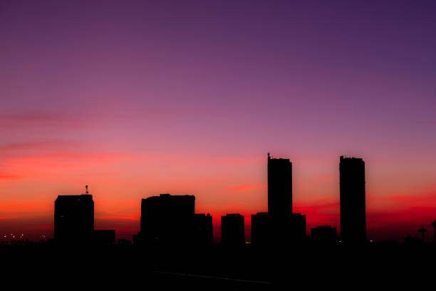 istock silhouette city at sunset sky 987687282