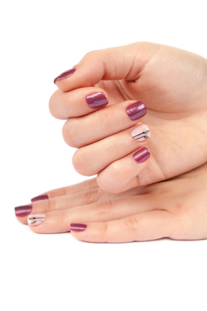 istock Beautiful female hands with manicure on white background 987708956