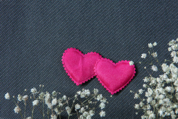istock Hearts and beautiful flowers on grey background 987733770