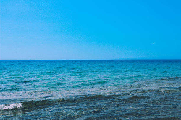 istock Sea water background. Blue ocean calm waves surface backdrop. 987736194