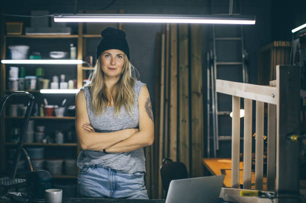 istock Carpenter woman portrait 987744776