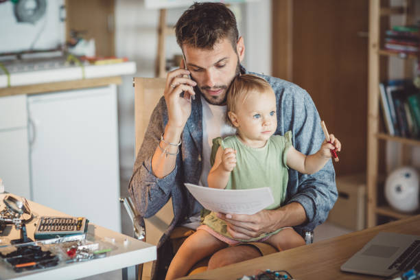 istock Father and daughter working together 987750170